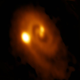 Our best view yet of a triple star system in the midst of forming. The bright object at left is the newest member of the group. (Image: B. Saxton: NRAO/AUI/NSF; ALMA (ESO/NAOJ/NRAO))